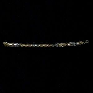 Beautiful 3 tone gold bracelet for women.14 kt